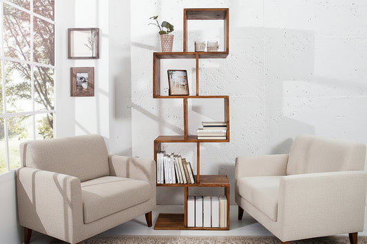 Wooden bookshelf with books and decorative items in a bright room