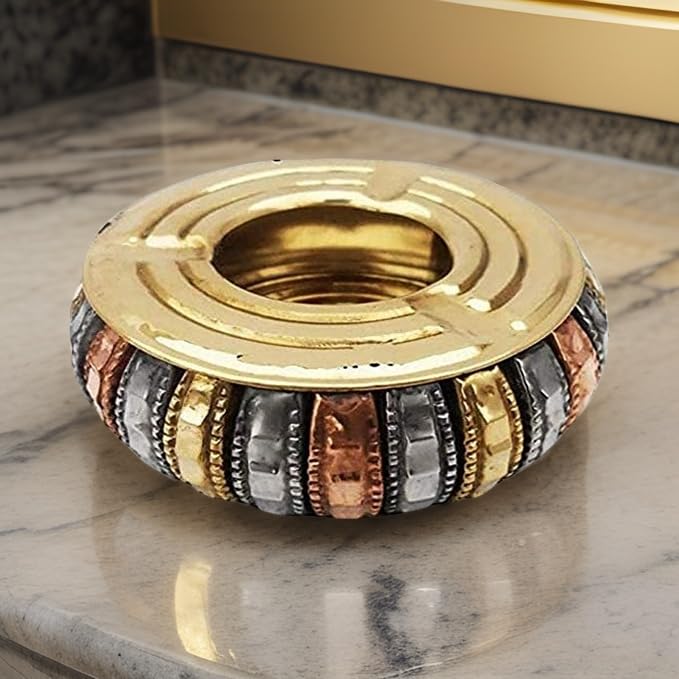 Brass Ashtray on Table