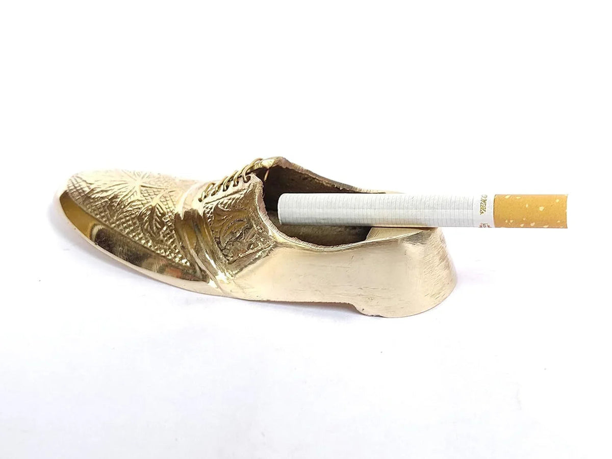 Handcrafted Brass Shoe Ashtray Design with cigar