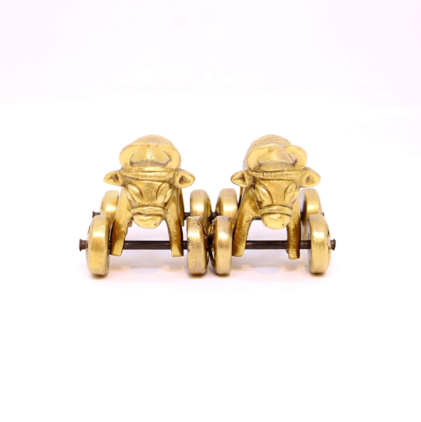 Gold-colored mechanical wheel on a white background