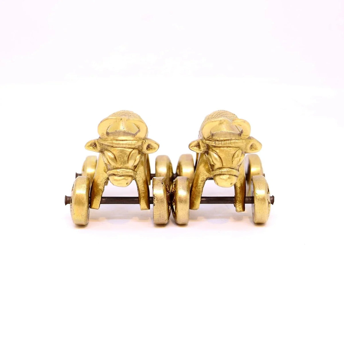 Gold-colored mechanical wheel on a white background