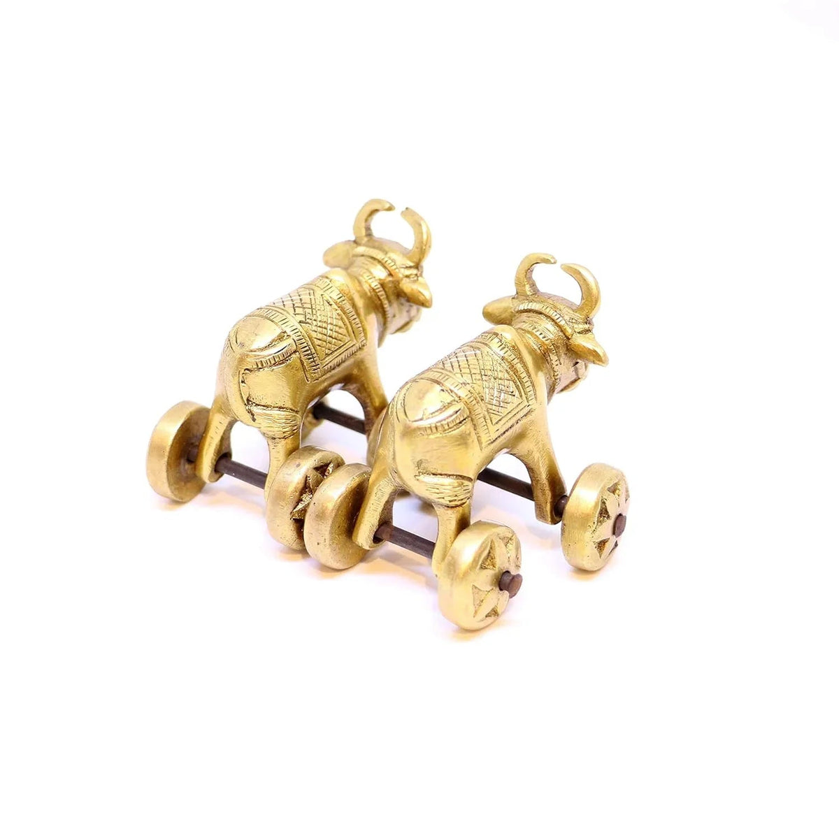 Gold elephant figurine on a white background