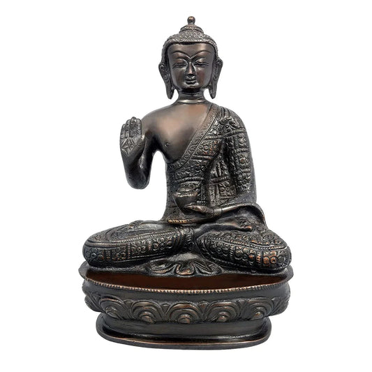 Handcrafted 7.5-inch solid brass Buddha idol seated in Abhaya Mudra, rich dark bronze antique finish with copper highlights, engraved robe border detailing on lotus base — ArtyCraftz