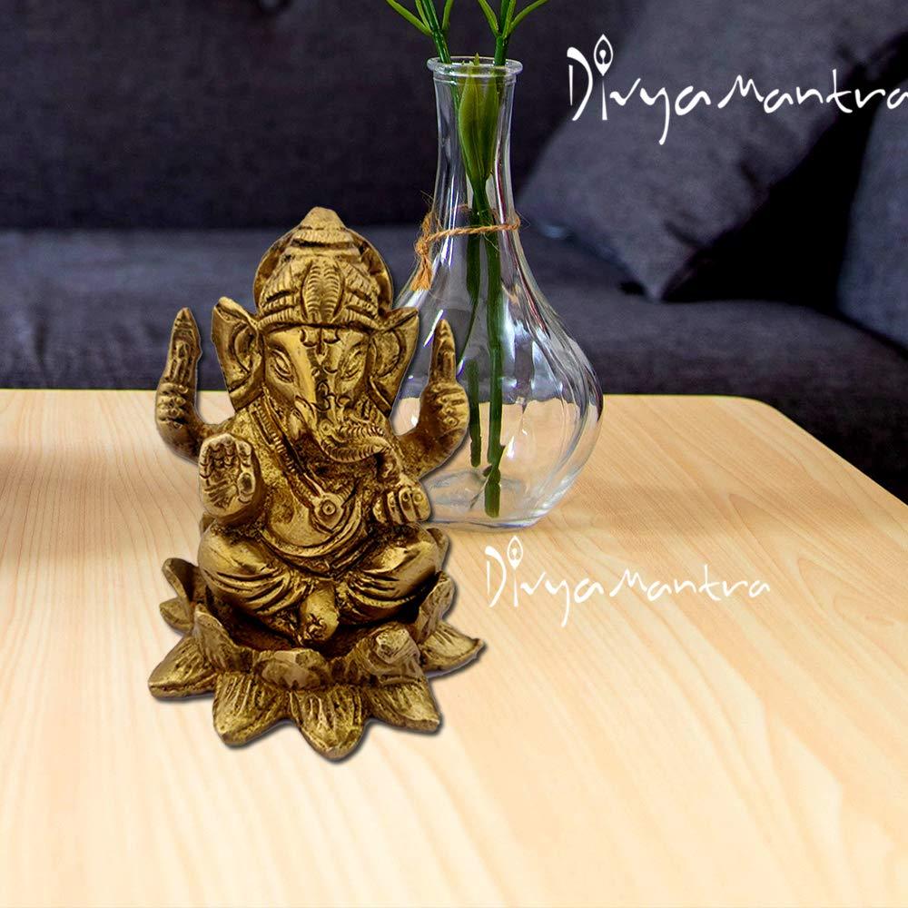 Brass Chaturbhuja Ganapati On Lotus Idol