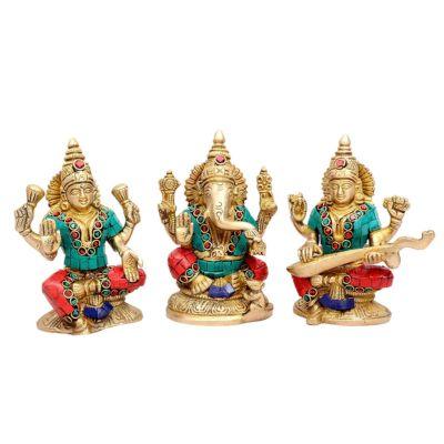 Brass Lakshmi Ganesha Saraswati Idol Set In White Background