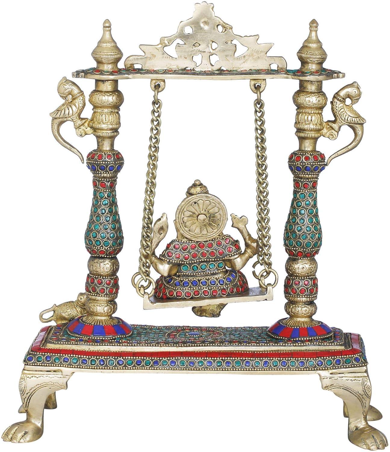 Handcrafted 13-inch solid brass Ganesha on swing Jhula idol — turquoise, coral and lapis stone-studded pillars, brass chain suspension, peacock finials, elephant feet base — ArtyCraftz