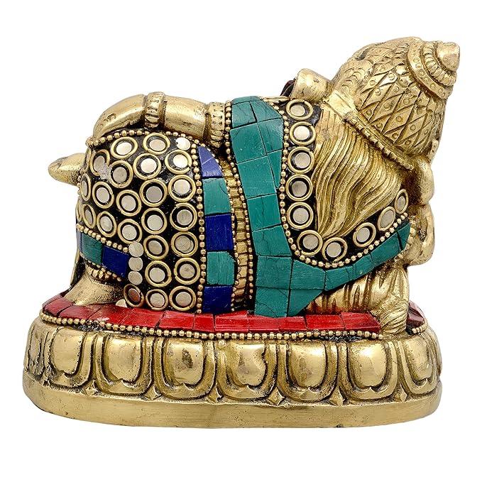 Handcrafted 4-inch solid brass reclining Ganesha idol with turquoise and coral stone inlay on garment and cushion, resting on lotus base — unique lazy Ganpati statue — ArtyCraftz