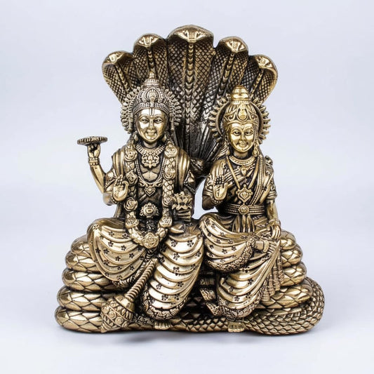 Brass Vishnu Lakshmi statue seated beneath Sheshnag-ArtyCraftz.com