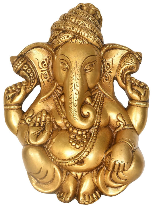 Handcrafted 10-inch solid brass Ganesha wall hanging in relief form, leaf-engraved trunk, jata crown, antique gold finish — premium sacred wall art by ArtyCraftz