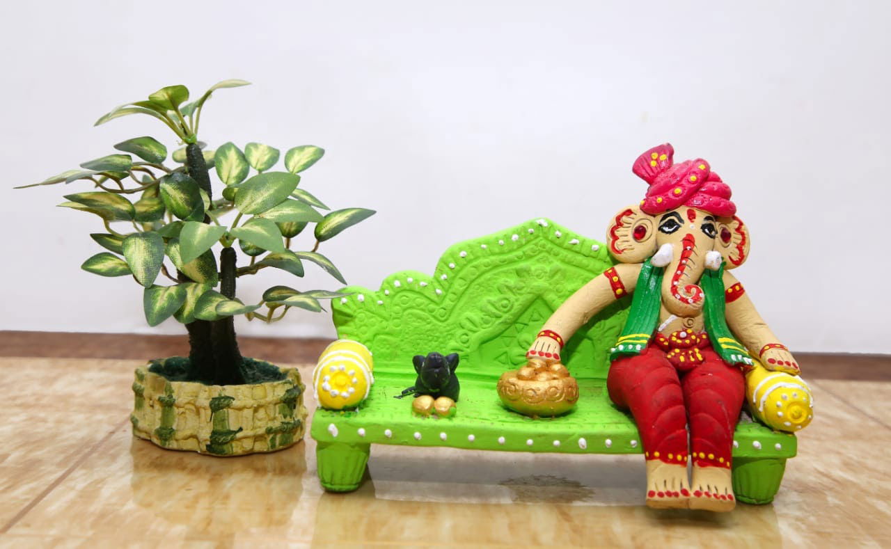 Handmade Terracotta Ganesh with Green sofa Idols for Gifting - ArtyCraftz.com