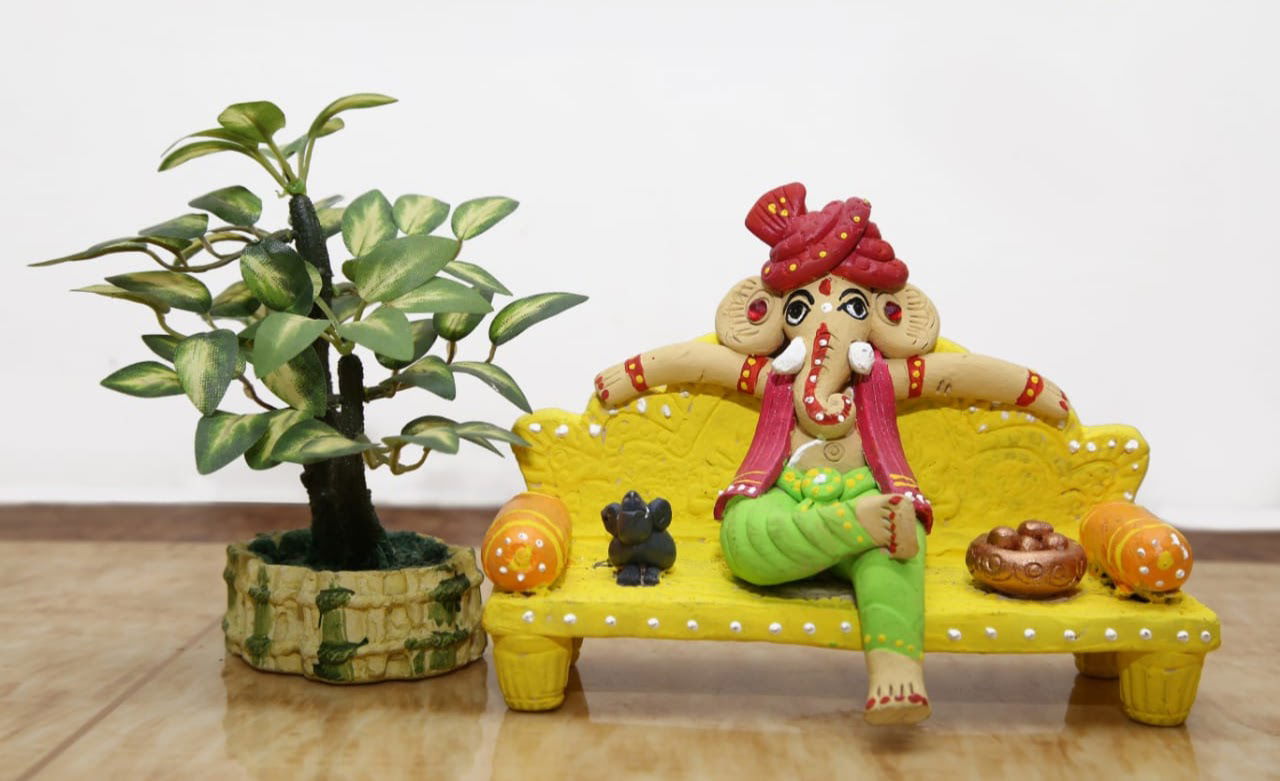Handmade Terracotta Ganesh with Yellow sofa Idols for Gifting - ArtyCraftz.com