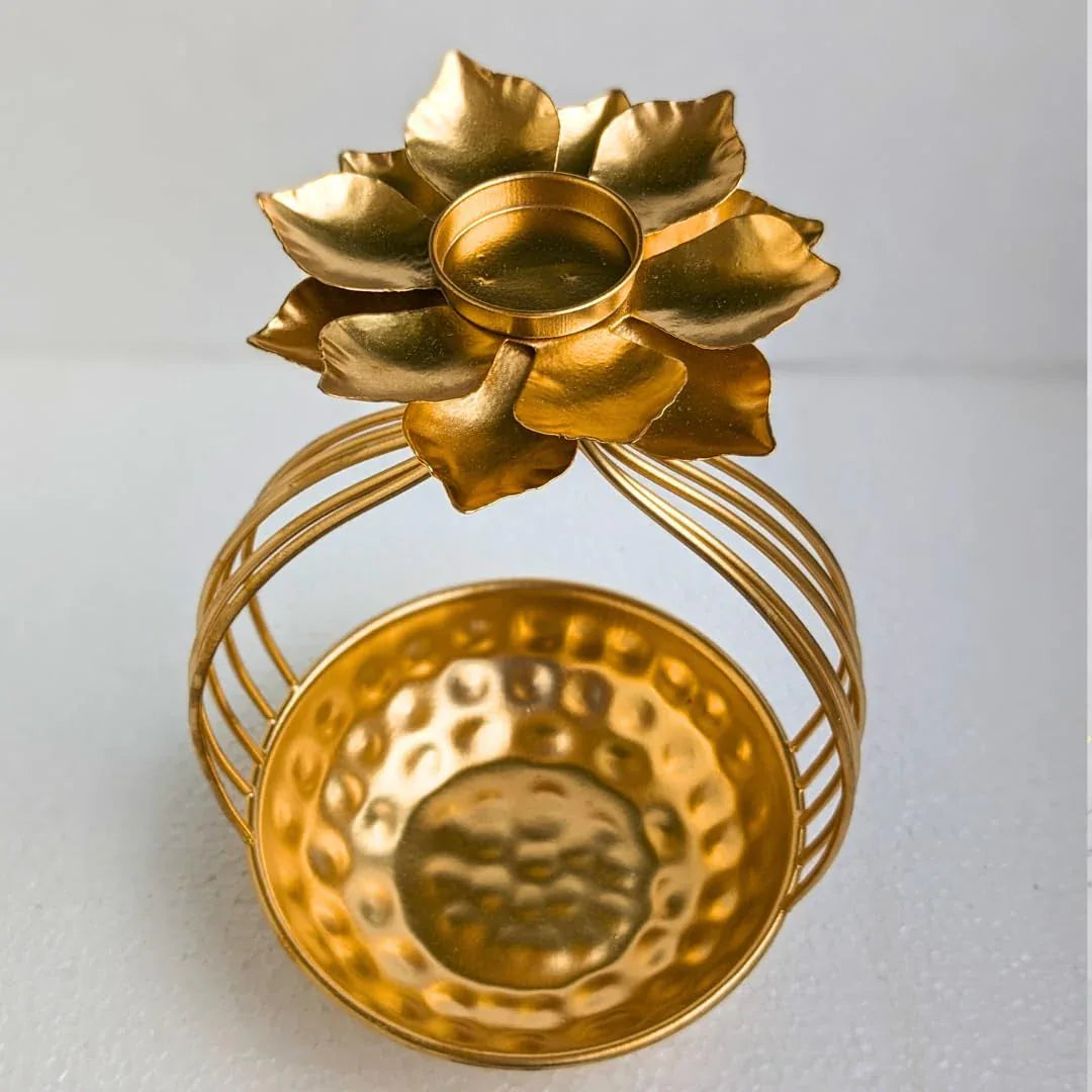 gold paled metal lotus diya with urli