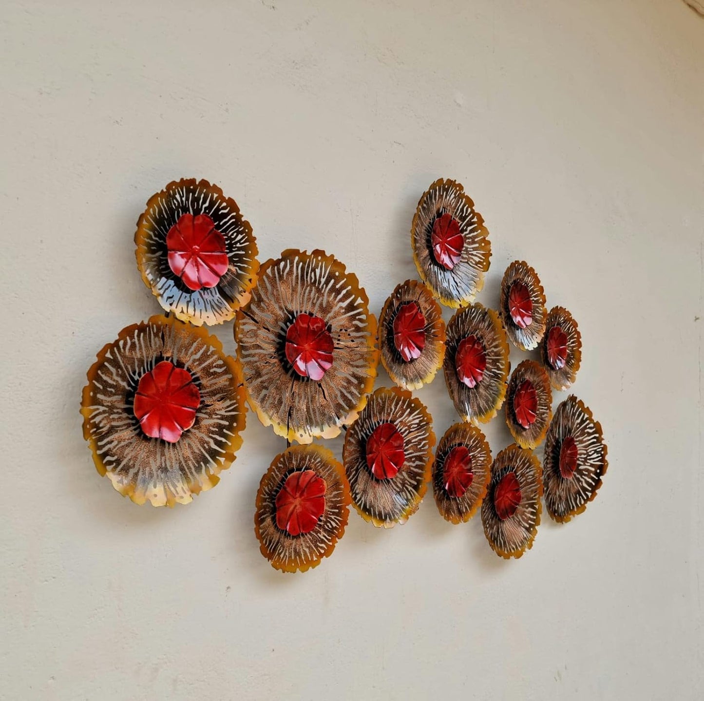 Modern floral metal wall art featuring multiple textured flowers with red centres-ArtyCraftz.com