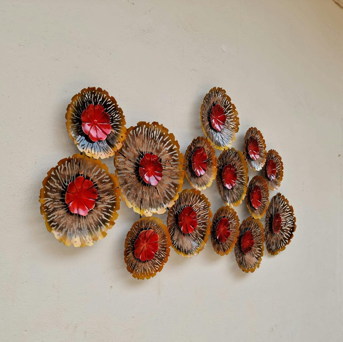 Modern floral metal wall art featuring multiple textured flowers with red centres-ArtyCraftz.com