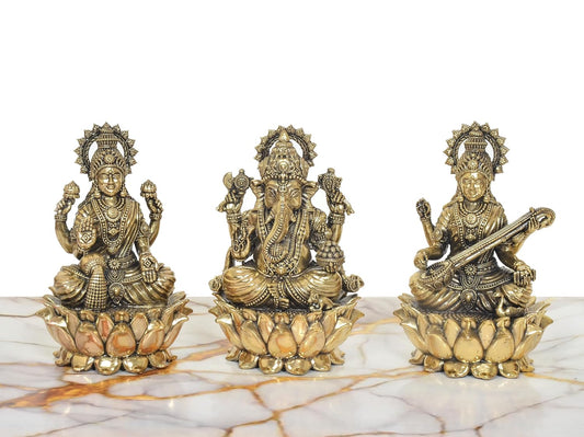 Set of 3 handcrafted 6-inch solid brass Lakshmi, Ganesha and Saraswati idols each seated on individual lotus base, antique gold two-tone finish — ArtyCraftz