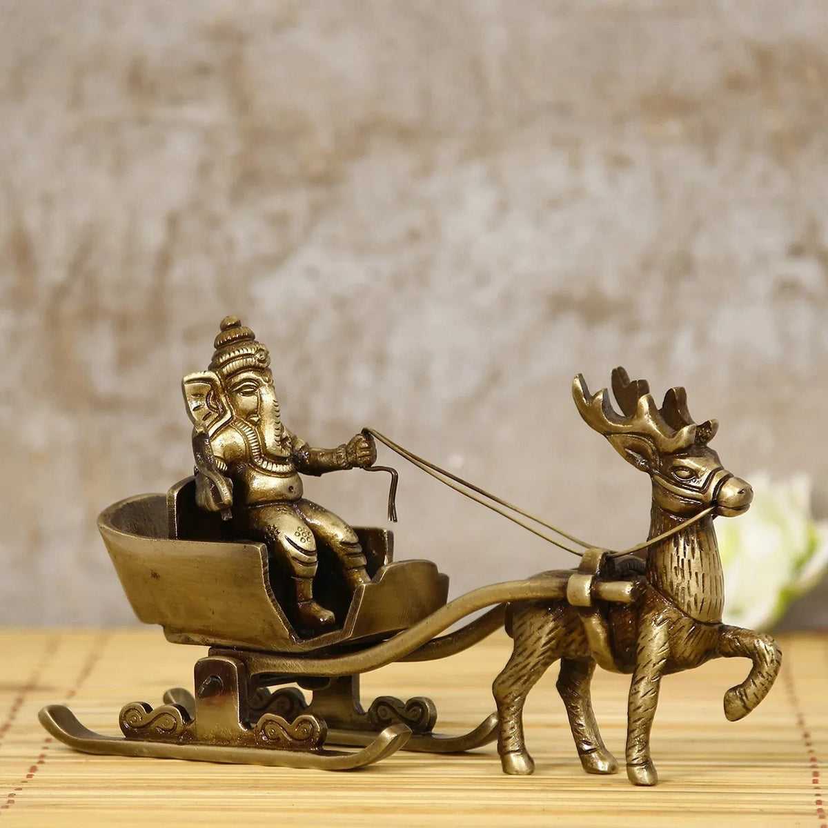 Gold Brass Ganesha Enjoying Ride With Deer Cart Decorative Showpiece - ArtyCraftz
