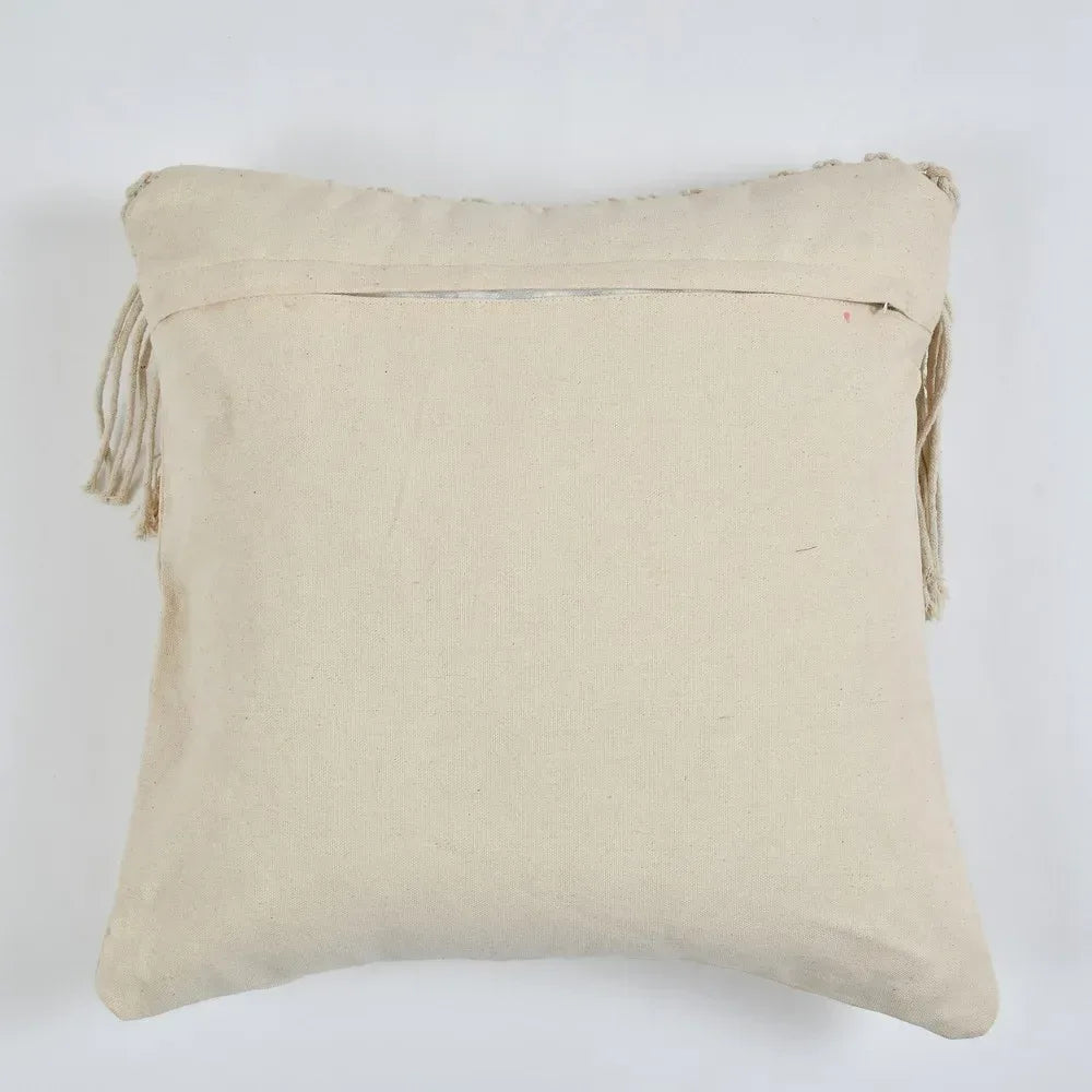 Beige pillow with tassels on a white background