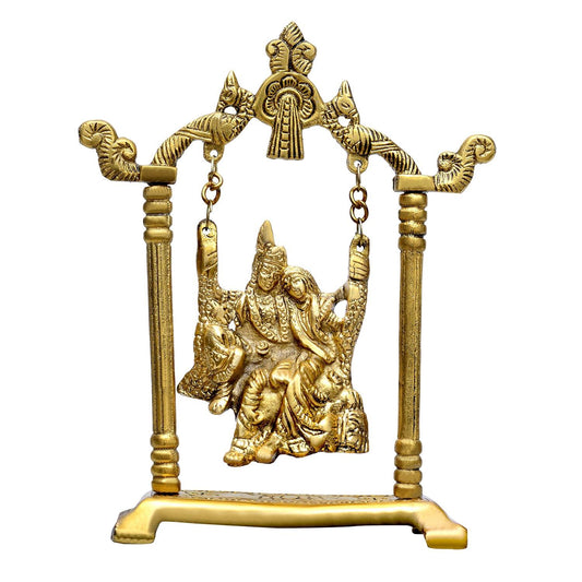 Handcrafted brass Radha Krishna on swing jhula idol — ornate peacock and scroll arch frame, chain-suspended swing seat, antique gold finish on rectangular base — ArtyCraftz