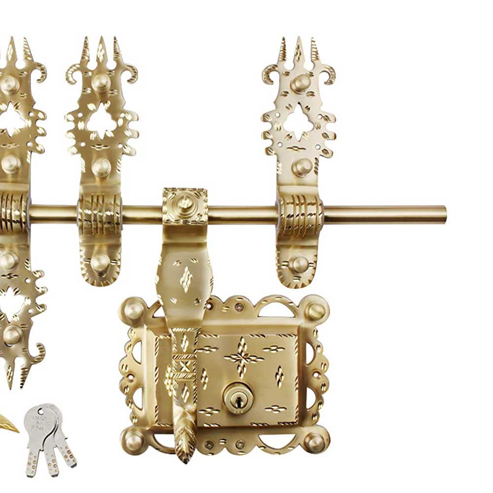 Decorative gold lock mechanism with intricate details on a white background