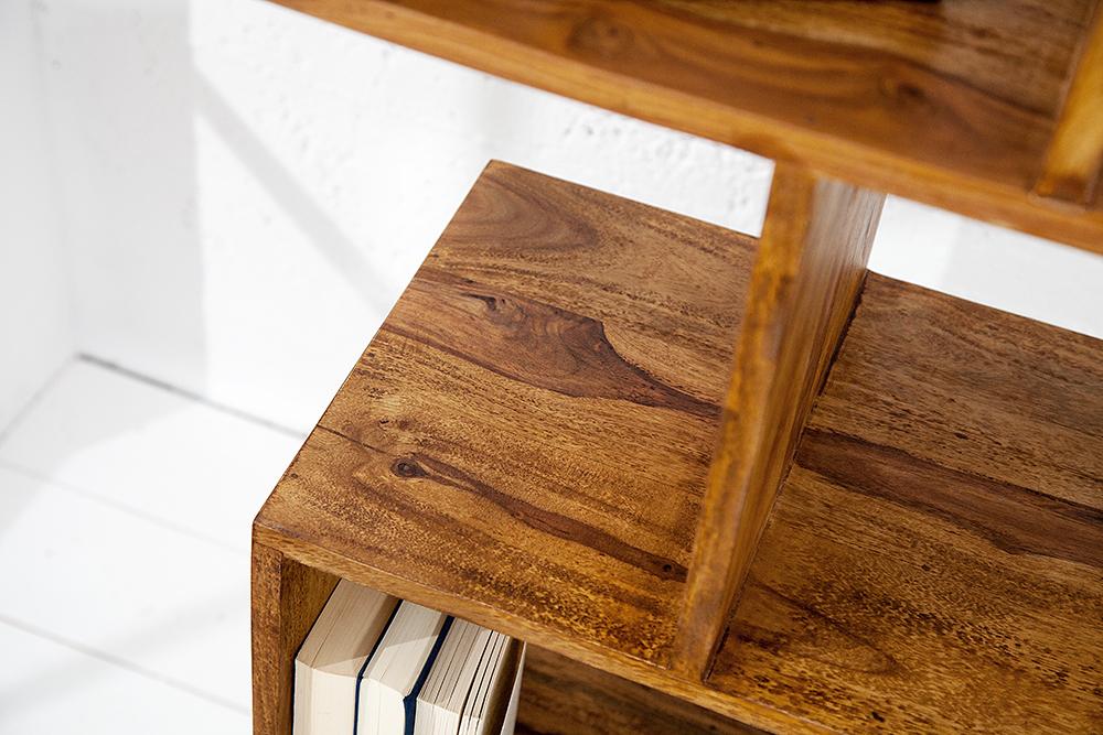 Wooden shelf with books on a white background