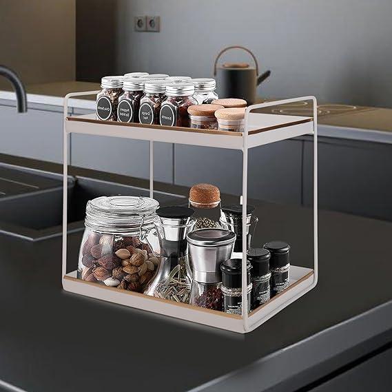 Kitchen spice rack with various jars on a kitchen counter