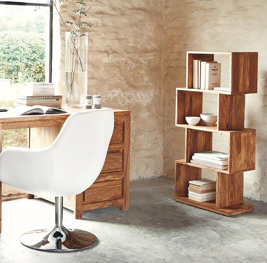 Wooden desk with white chair and bookshelf in a room with large windows
