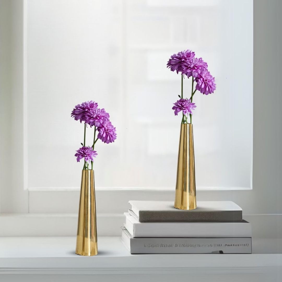 Two gold vases with purple flowers