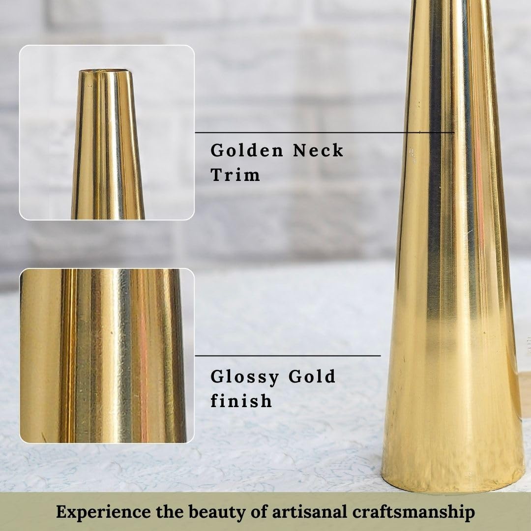 Gold vase with golden neck trim and glossy finish on a textured surface.