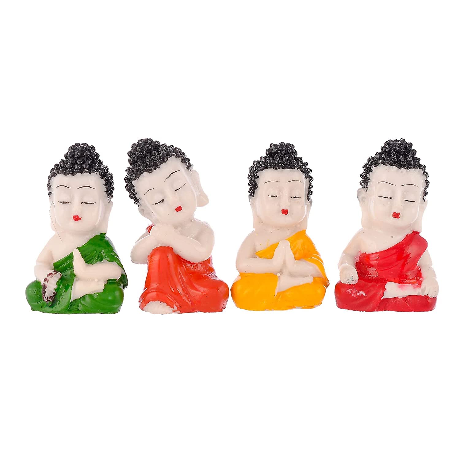 Four small Buddha figurines in different colored robes on a white background