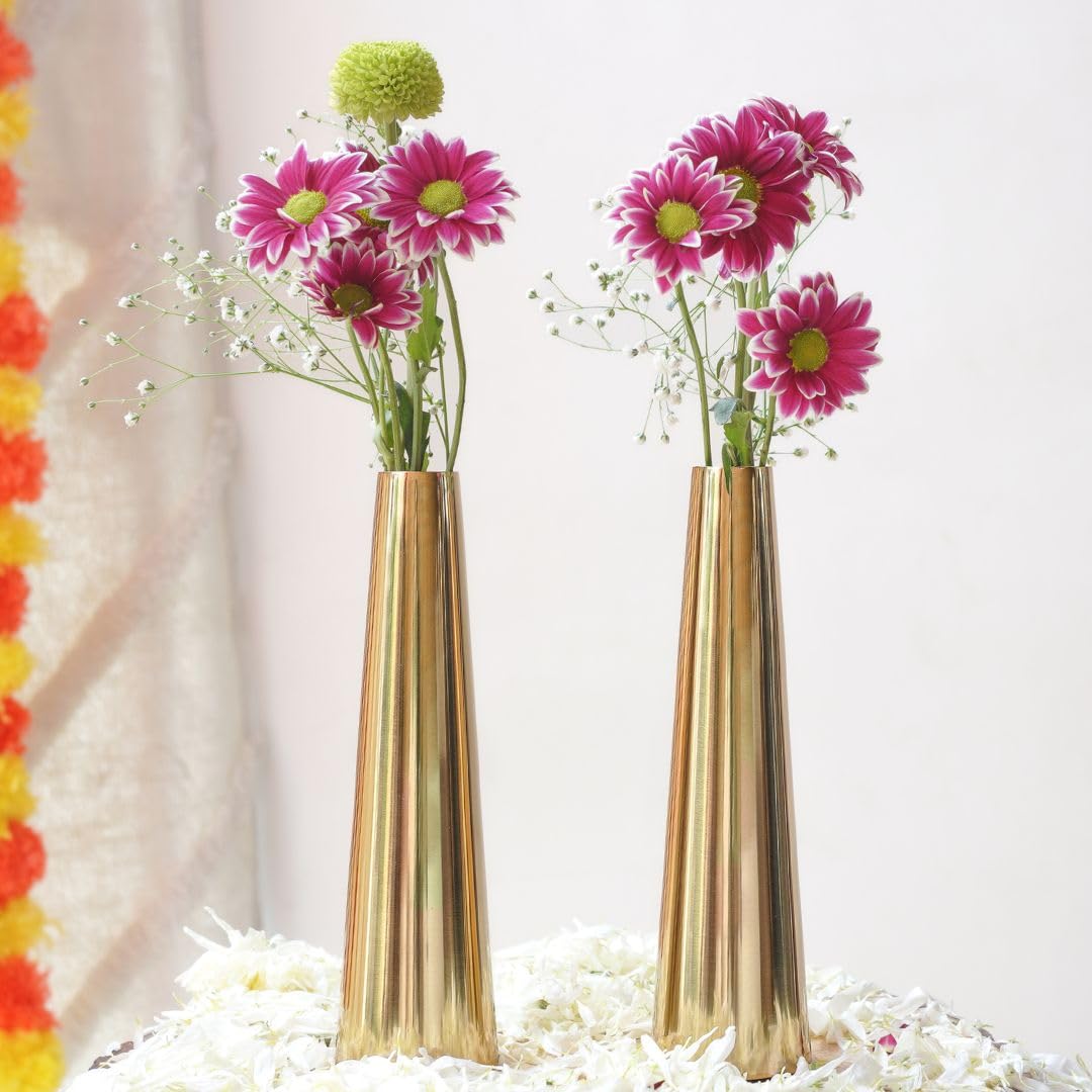 Two gold vases with pink flowers