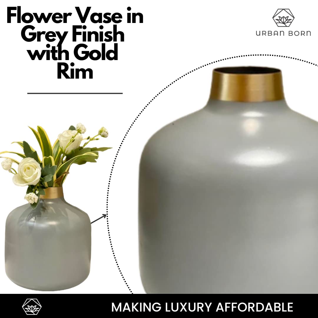 Gray flower vase with gold rim containing flowers