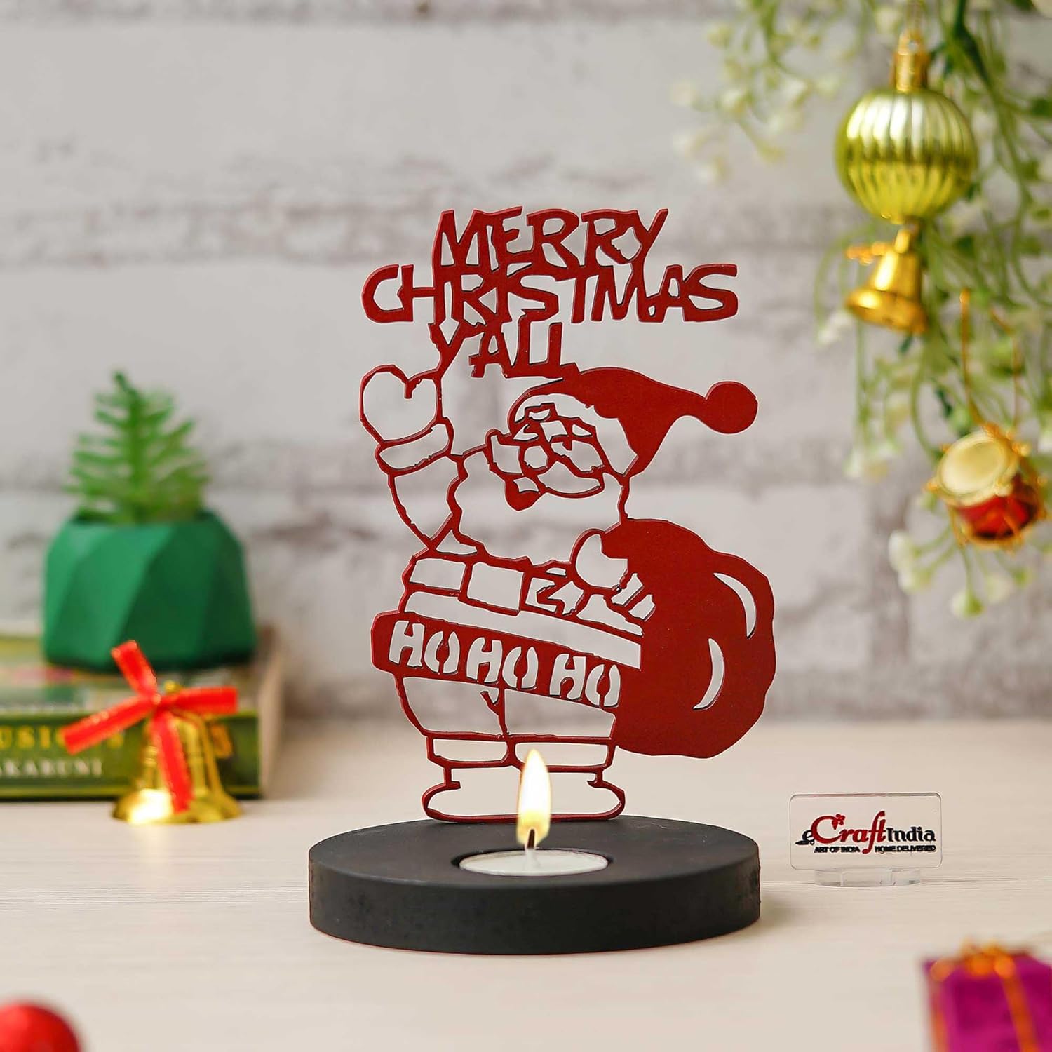 Decorative candle holder with Santa Claus design and 'Merry Christmas Y'all' text