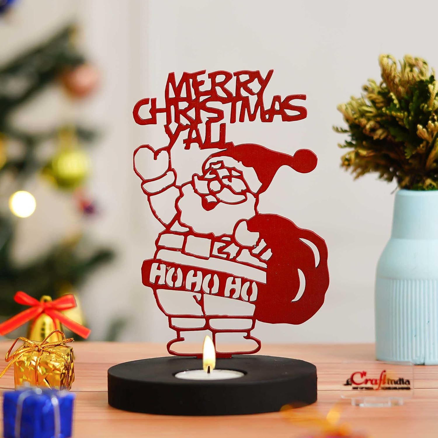 Decorative candle holder with Santa Claus design and 'Merry Christmas Y'all' text