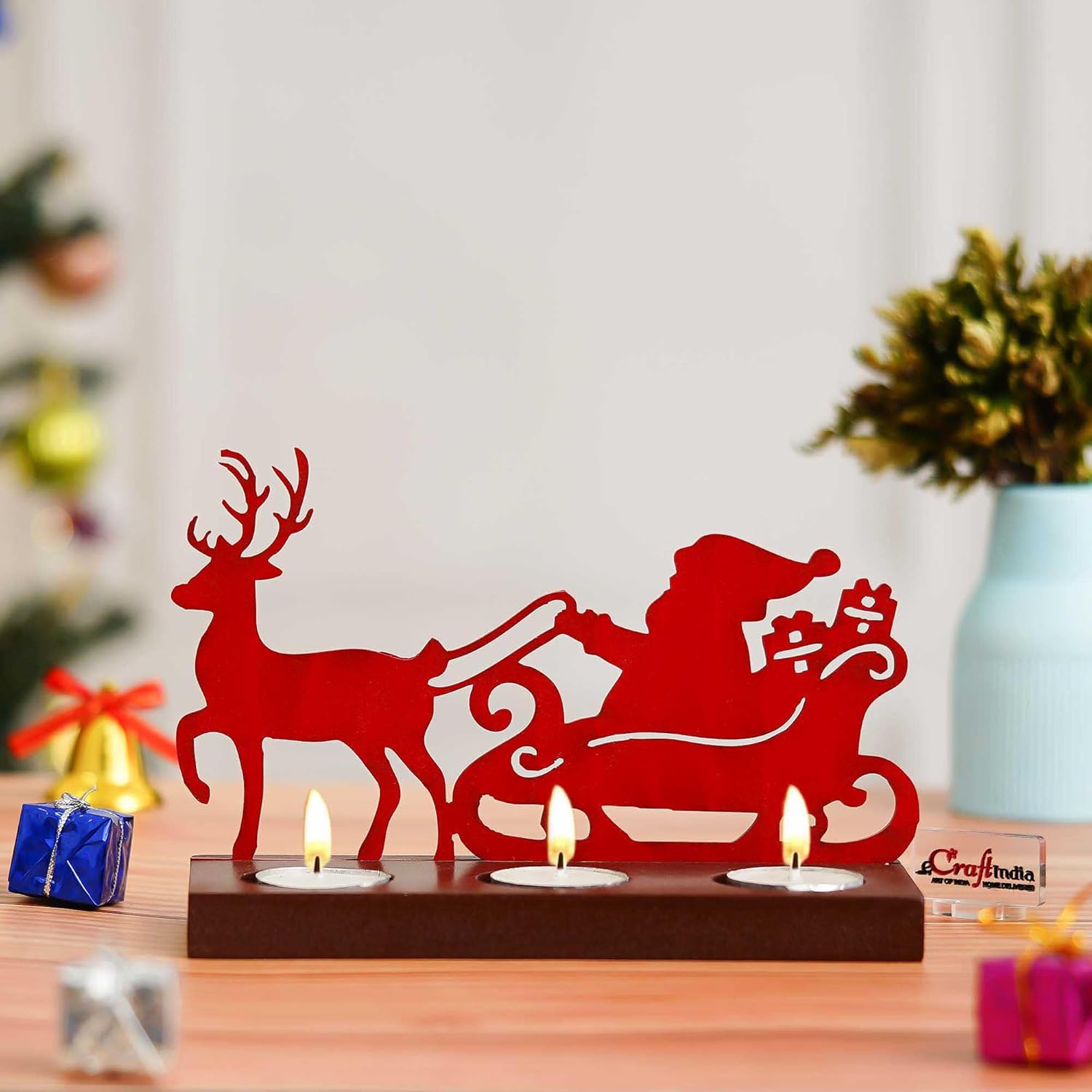 Decorative candle holder with Santa Claus and reindeer design