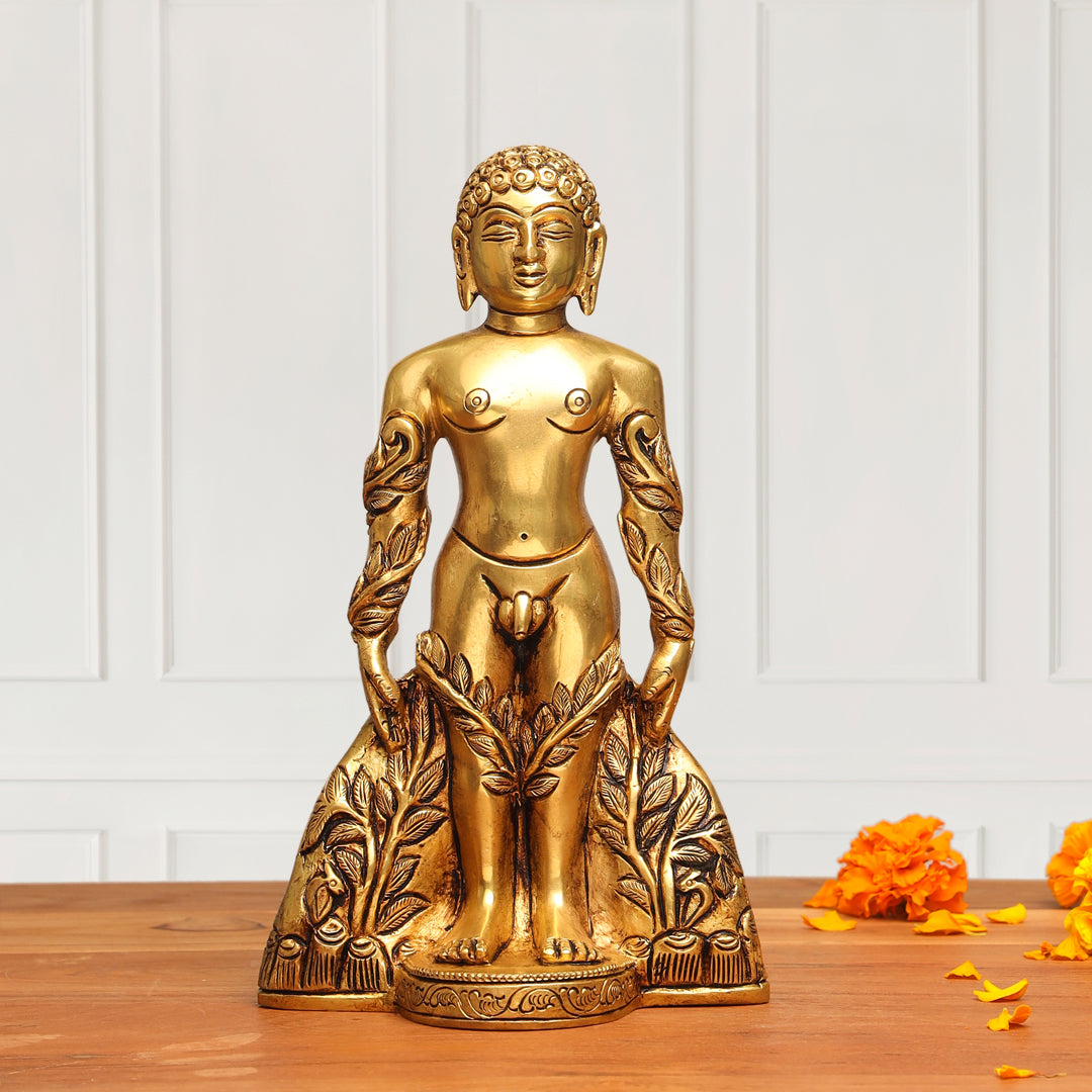 Gold Buddha statue on a wooden surface with a white paneled wall background