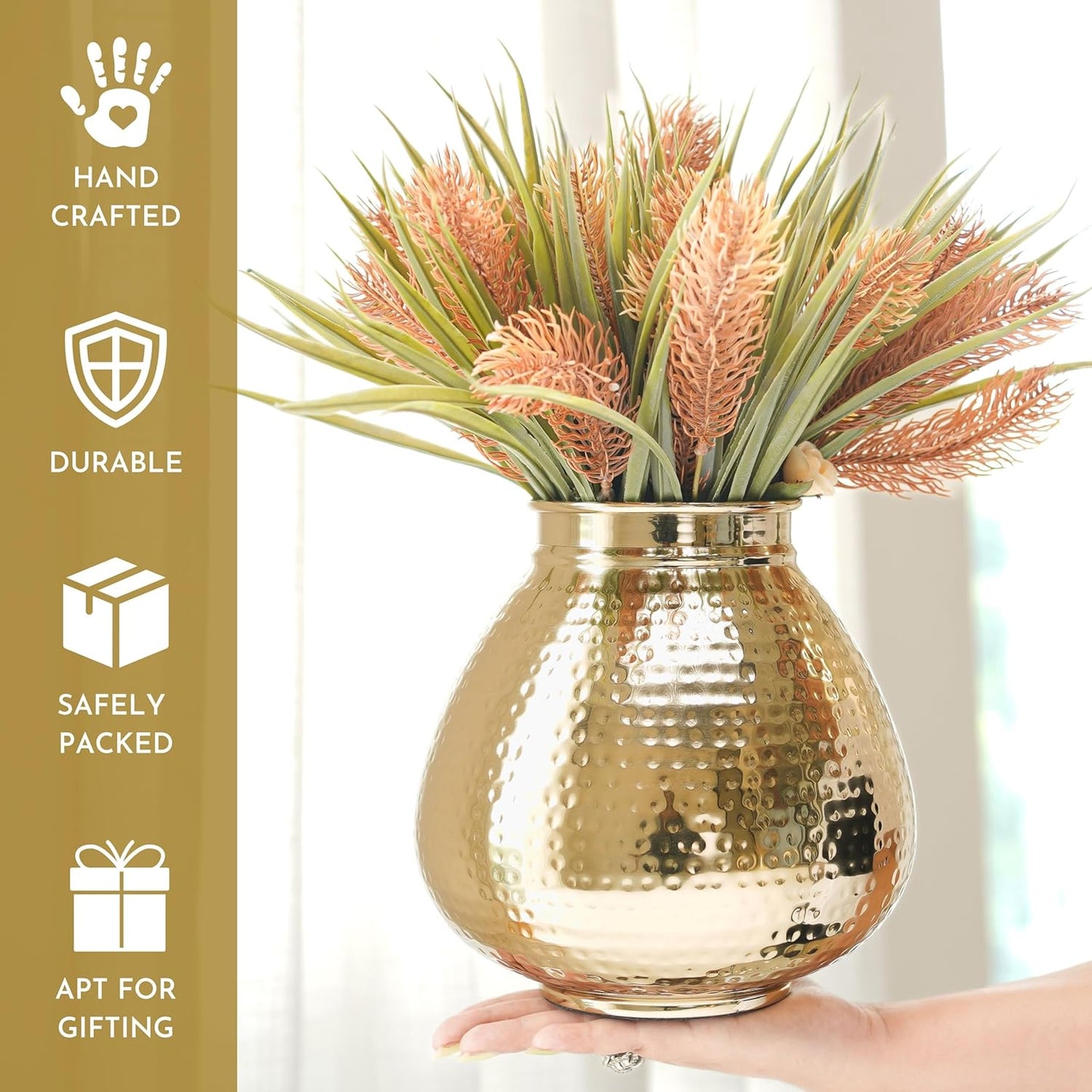 Gold vase with decorative plants held by a hand, with product features on the left.