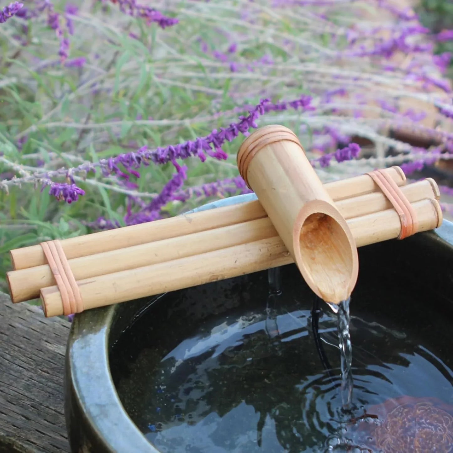 Bamboo Three Arm Water Spout & Pump Installed in Garden