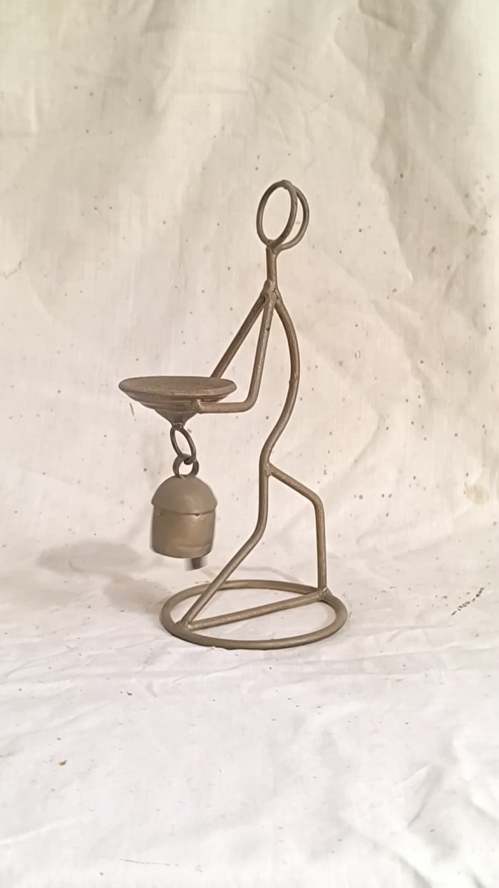 Man Candle Holder Iron Bell
