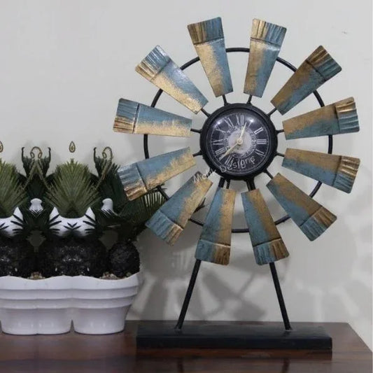 Vintage windmill table clock with distressed blue and gold metal blades and Roman numeral clock face-ArtyCraftz.com