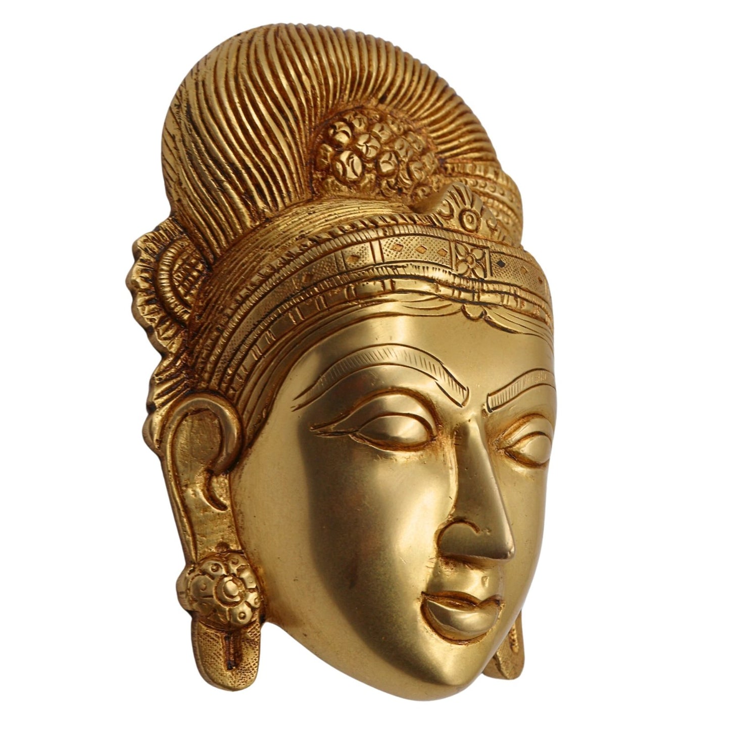 Gold-colored decorative mask with intricate designs