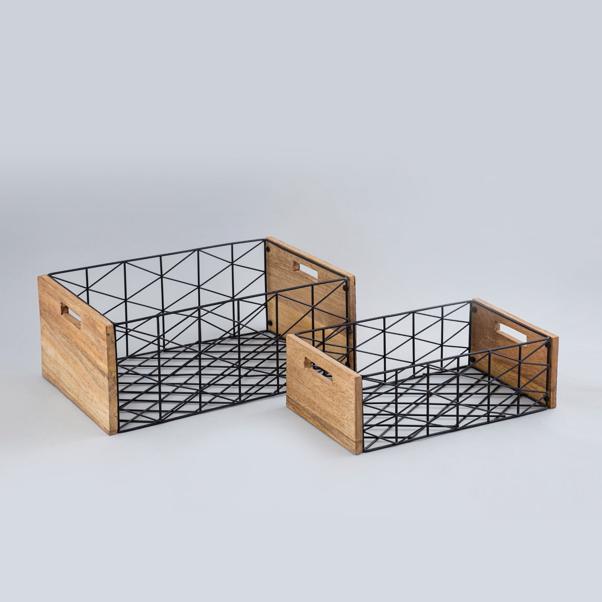 Two wooden crates with black metal frames