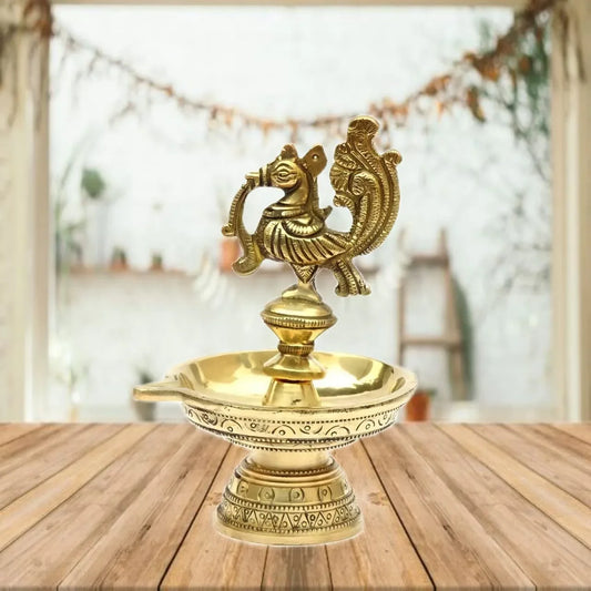 Brass Peacock Diya Seated in a Sturdy
