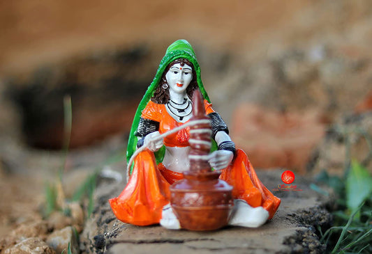 Rajasthani Lady Using Makhan Handi/Chaas Polyresin Statue (10 cm x 12.5 cm x 15 cm) - ArtyCraftz.com