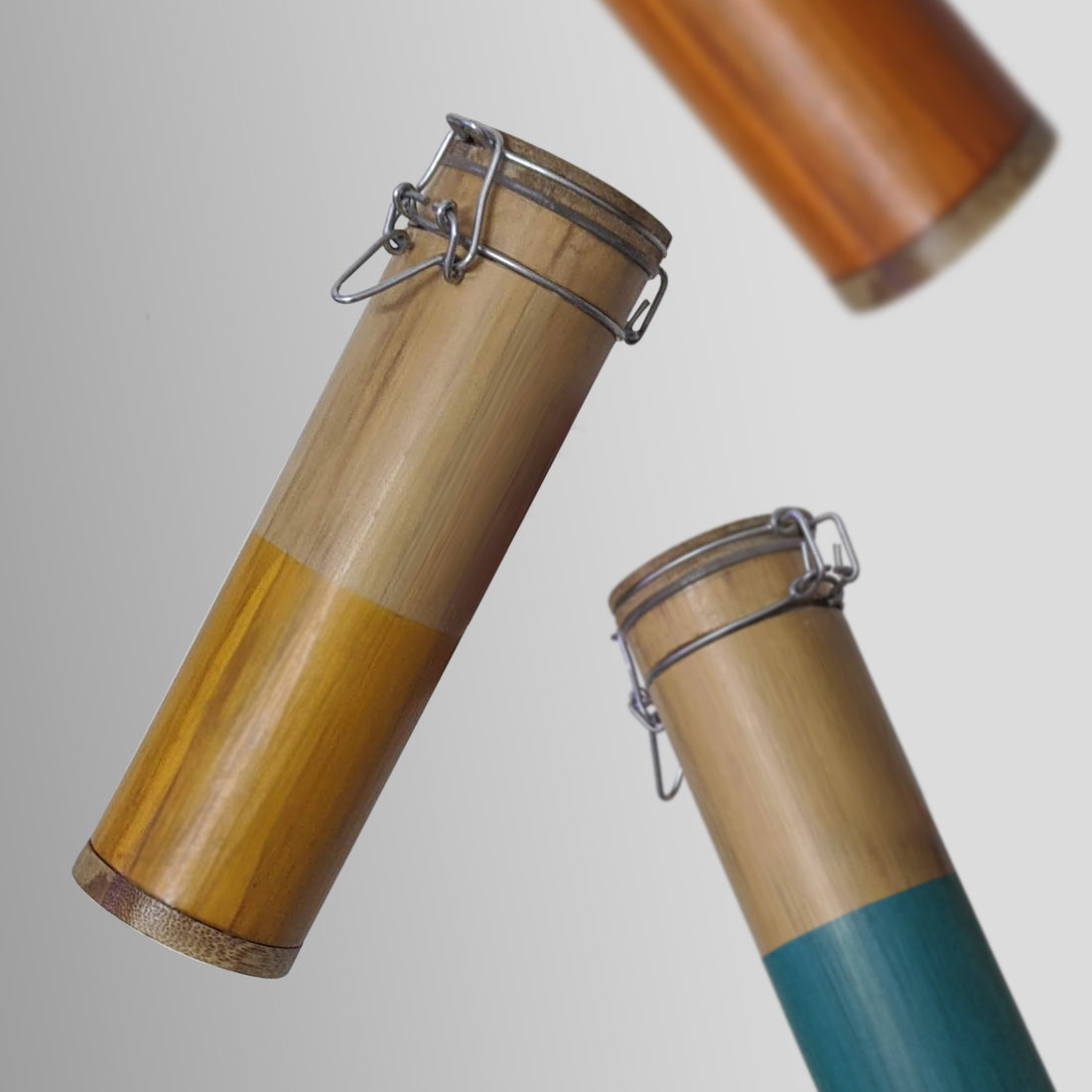 Cylindrical bamboo containers with metal clamps