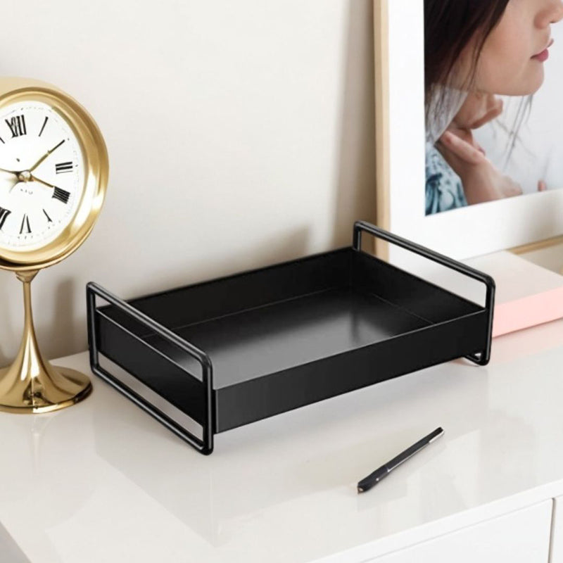 Black metal tray on a desk