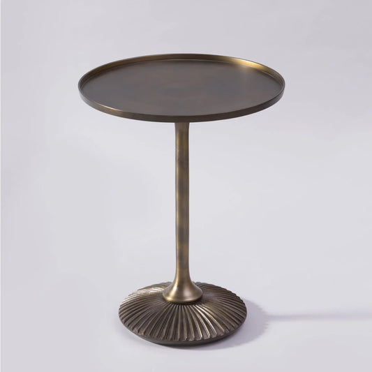 Brass side table with a textured base