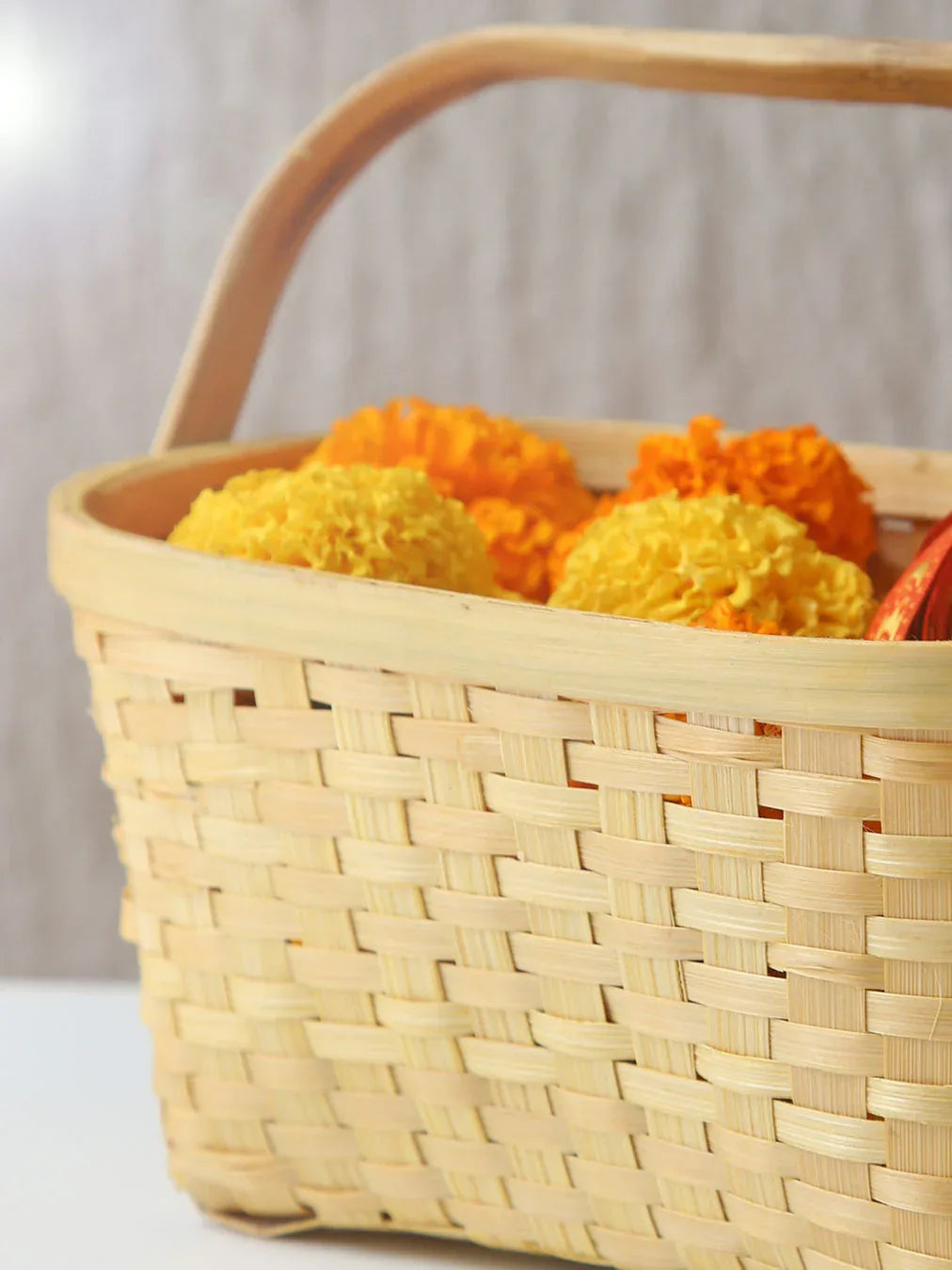 Wicker basket with marigold flowers
