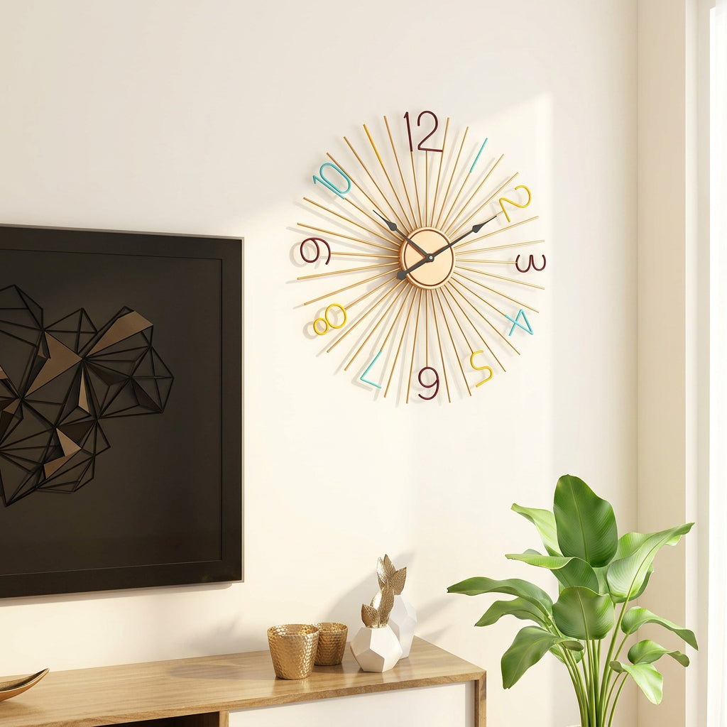Gold iron sunburst wall clock with multicolored numerals and radiating metal rays, measuring 24 inches in diameter-artycraftz.com