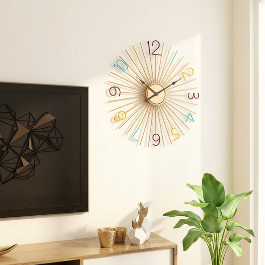Gold iron sunburst wall clock with multicolored numerals and radiating metal rays, measuring 24 inches in diameter-artycraftz.com