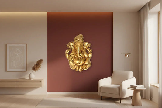 Handcrafted 10-inch solid brass Ganesha wall hanging in relief form, leaf-engraved trunk, jata crown, antique gold finish — premium sacred wall art by ArtyCraftz